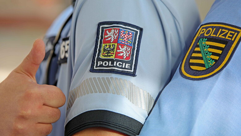 Wappen der tschechischen und sächsischen Polizei